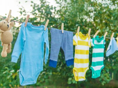 washing baby clothes. Linen dries in the fresh air. Selective focus. washing baby clothes. Linen dries in the fresh air. Selective focus. nature.